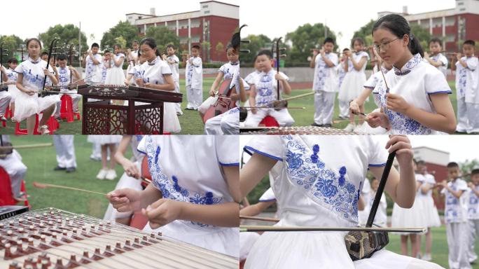 学生在操场表演演奏民族乐器