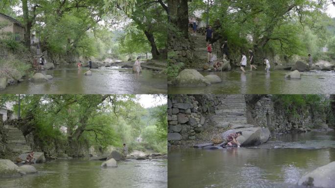 4K孩子在小河蹚水玩山村小溪用棍棒洗衣服