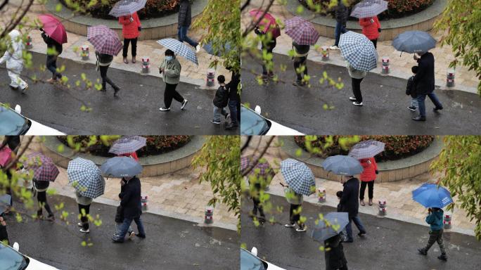 防疫志愿者冒雨维护核酸检测队伍2