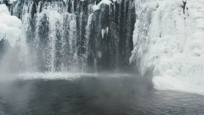 冬季吉林通化吊水壶瀑布自然风光航拍4K