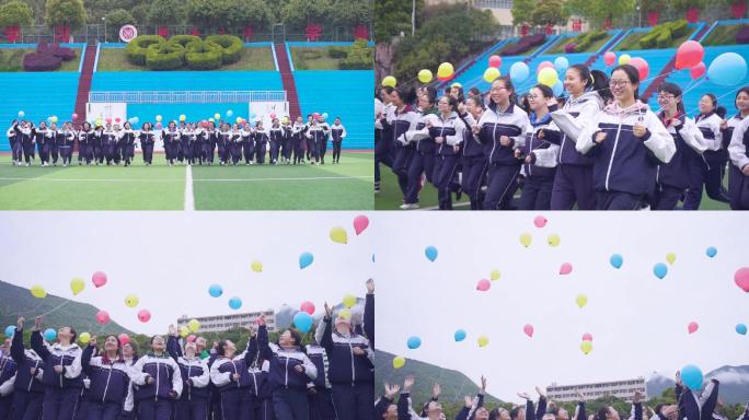 青年团员学生奔跑放飞气球