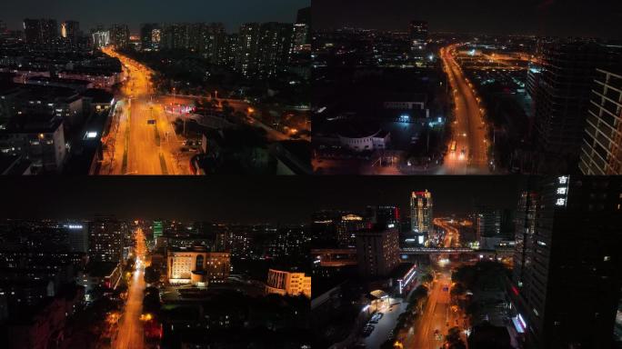 夜景空旷大街，人稀车少，上海汽车城