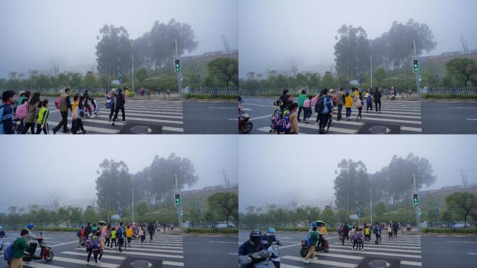 城市大雾天气学生过马路上学