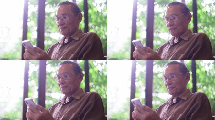 使用手机的老人晚年生活上网聊天新闻视频