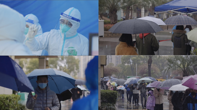 雨天居民排队做核酸检测医护人员辛苦工作
