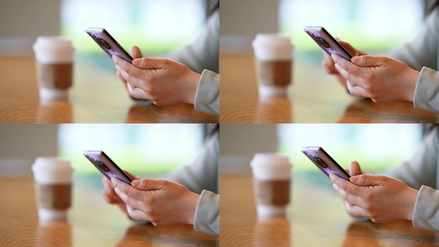 年轻女子在咖啡店使用手机刷朋友圈