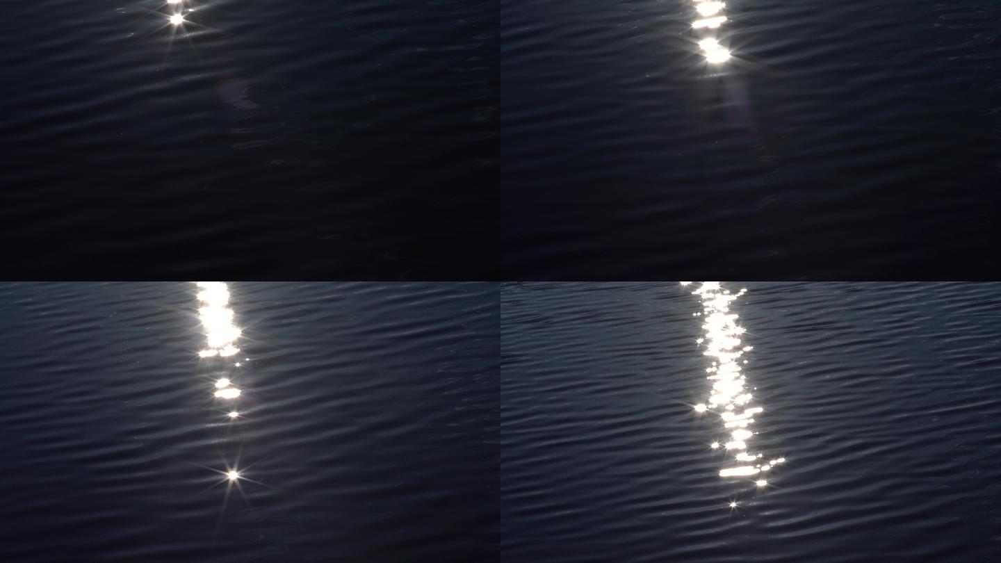 一缕阳光反射在湖面上，闪闪发光