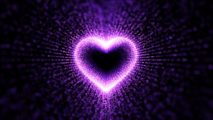 黑色背景中的紫色粒子心形