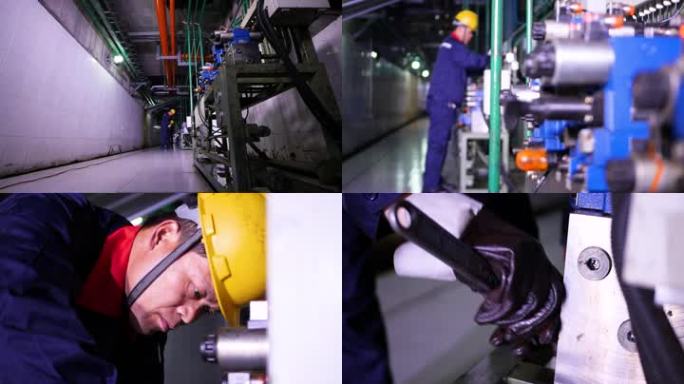 技术工人检查维护工厂车间设备机器