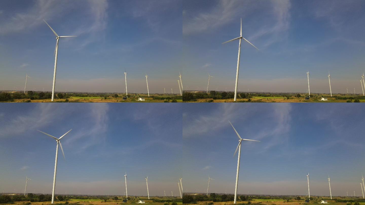 蓝天下的旋转风机节能环保清洁能源风车发电