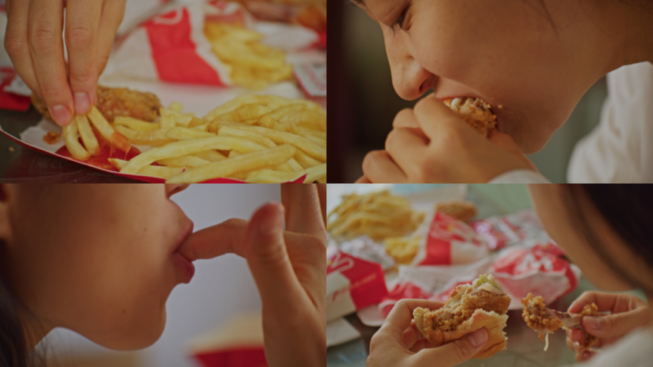 女人暴饮暴食吃汉堡不健康饮食