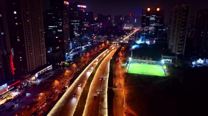 4K原创实拍城市夜间道路足球场视频素材