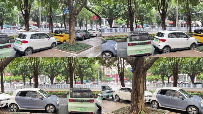 扏堆停马路边停车位的绿色新能源微型代步车