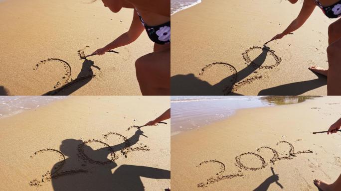 在沙滩上写新年海边海岸海洋