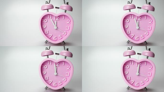 粉色闹钟显示时间流逝