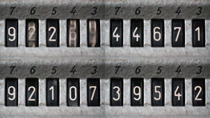 在老式计数机上旋转的数字特写镜头。