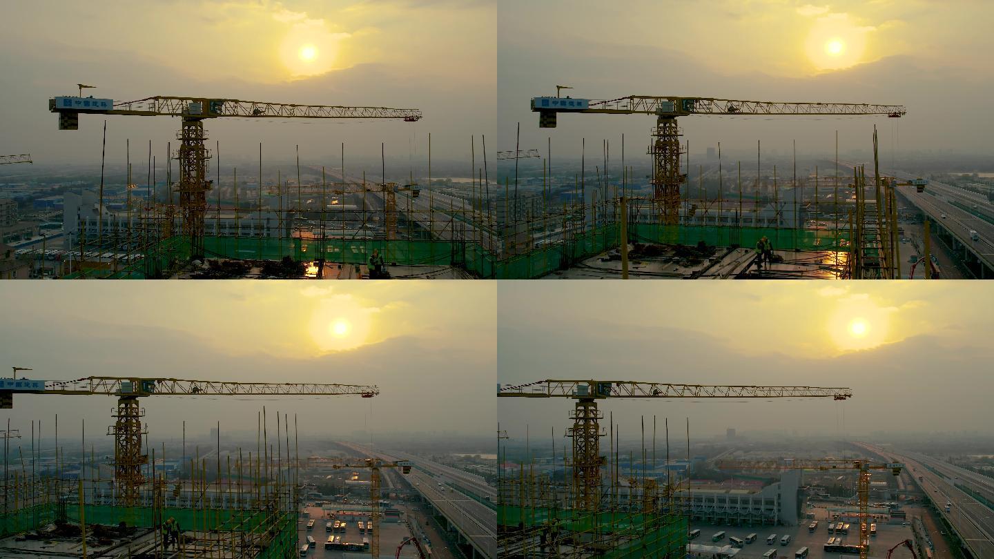 4k航拍中国建筑塔吊夕阳下工作