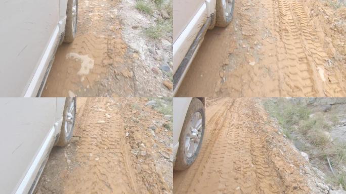 汽车行驶在泥路上 轮胎特写