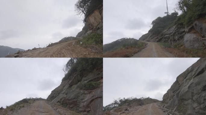 汽车行驶在悬崖峭壁的山路上