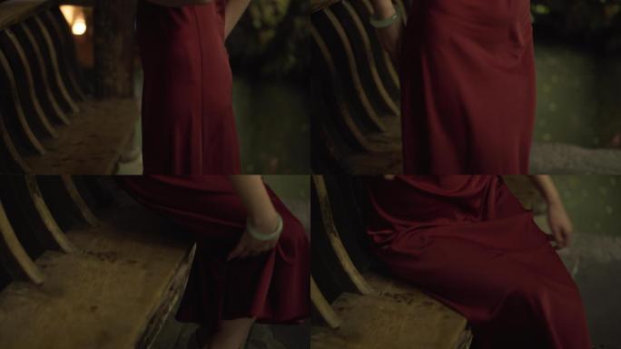 夜市 旗袍 红衣女子优雅坐下