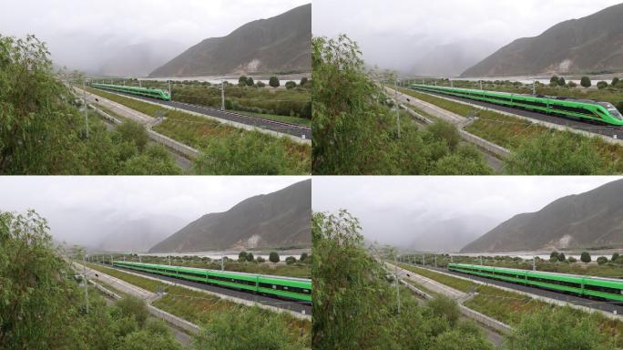 拉林铁路绿巨人雅鲁藏布江岸边雨中飞驰