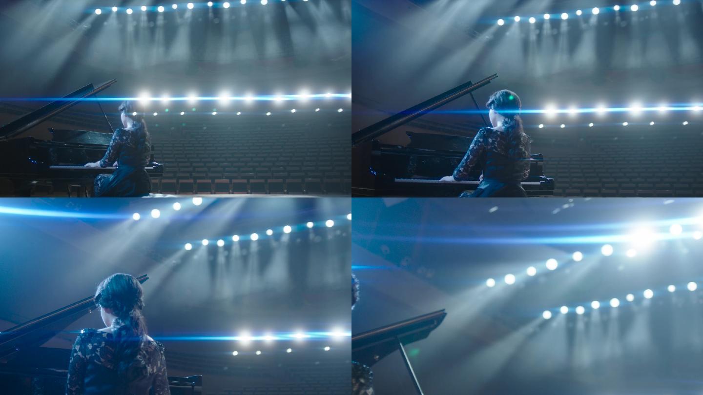 聚光灯下音乐厅弹钢琴的演员