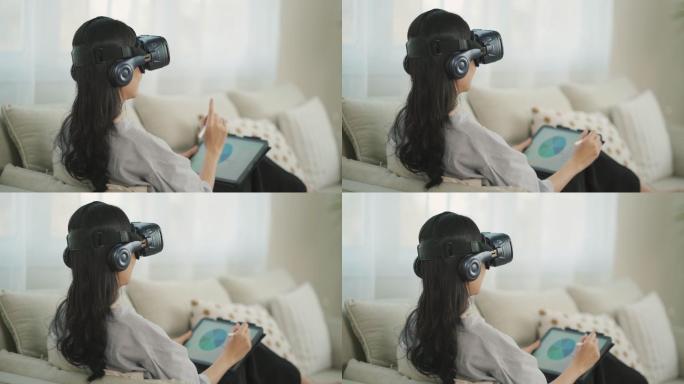 女人使用虚拟现实眼镜分析图表