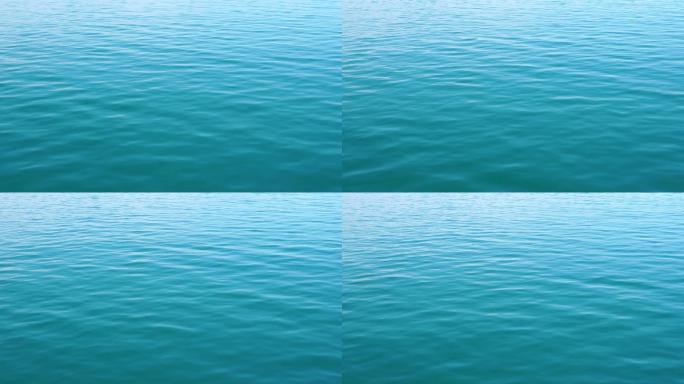 平滑平坦的海面海平面微风吹拂海面蓝色海面