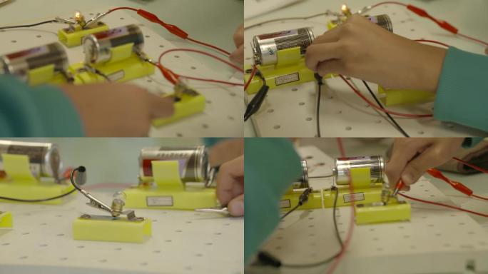 小学生物理课堂电池测电压导电小实验灯泡