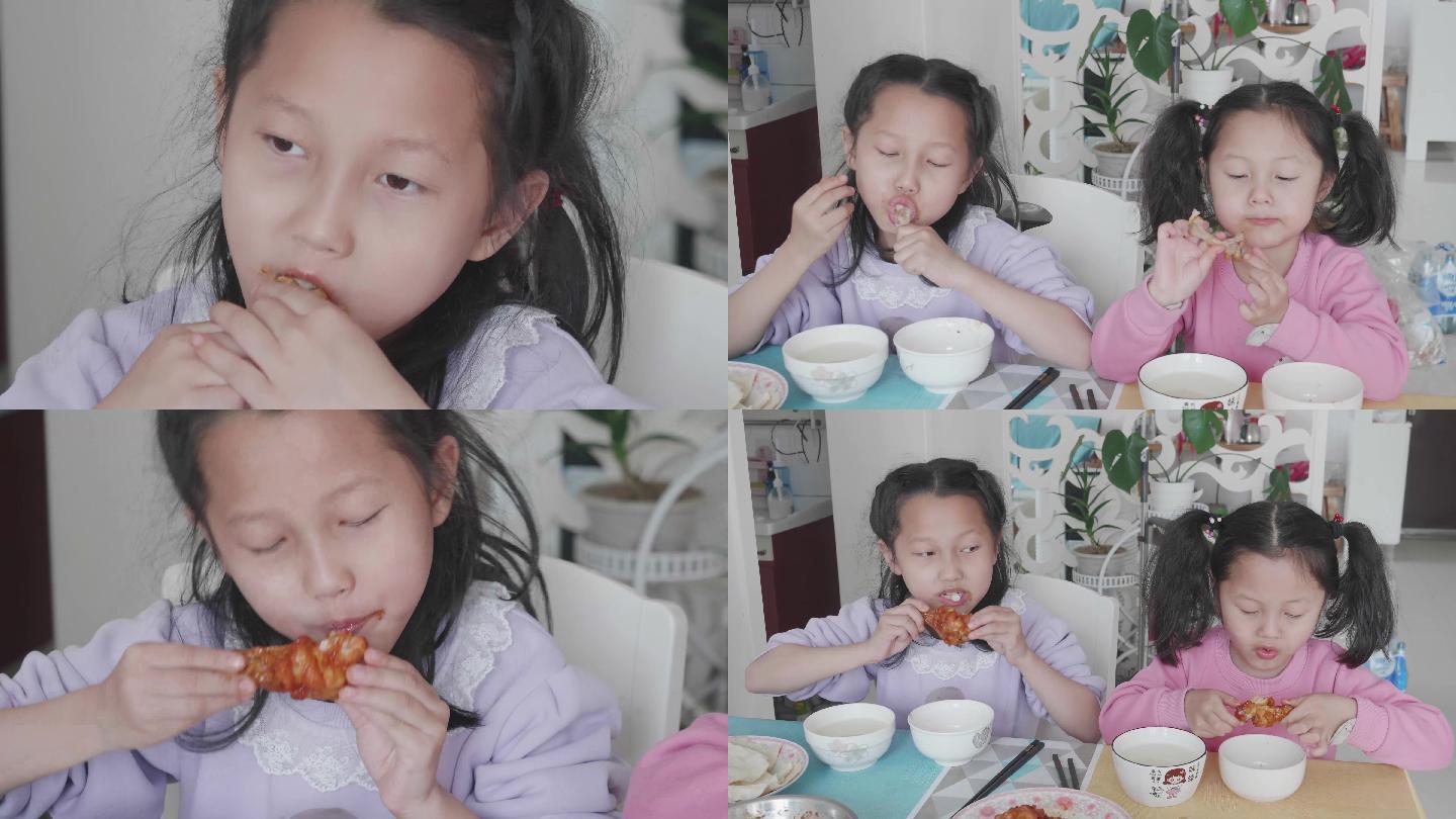 儿童挑食小女孩吃鸡腿健康食品姐妹俩吃饭