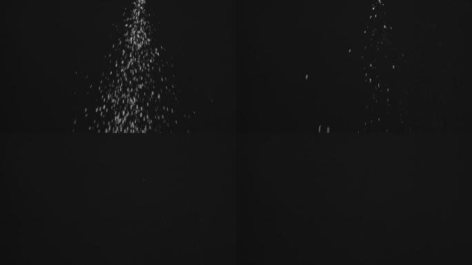 黑色背景前的白糖特效动画合成元素光效