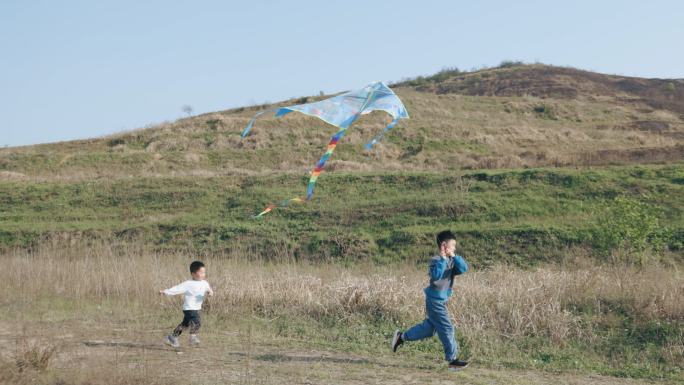 4K春天两个小孩放风筝慢动作