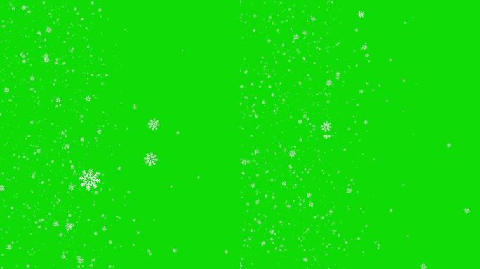 绿色背景前的雪花场景舞台飘雪降雪飞雪小雪