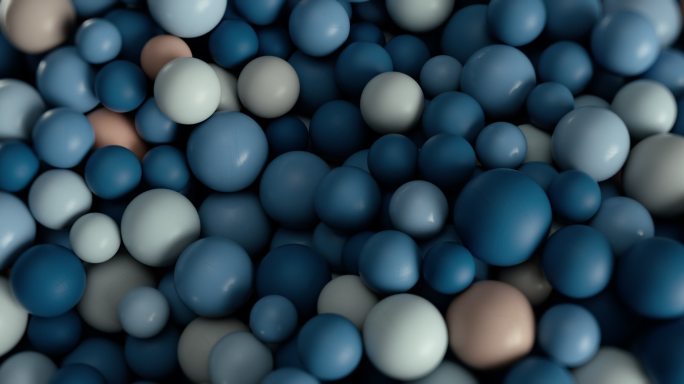 不同大小和颜色的塑料球，滚动，相互碰撞