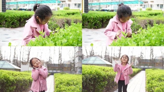 小女孩绿叶丛中玩耍转圈抬头快乐童年