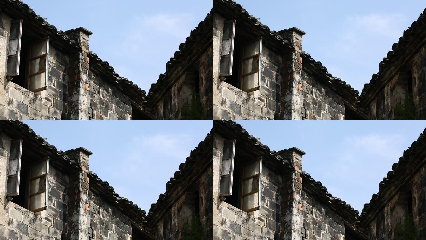 江南传统民居砖瓦房老房子烟囱窗户黑瓦蓝天