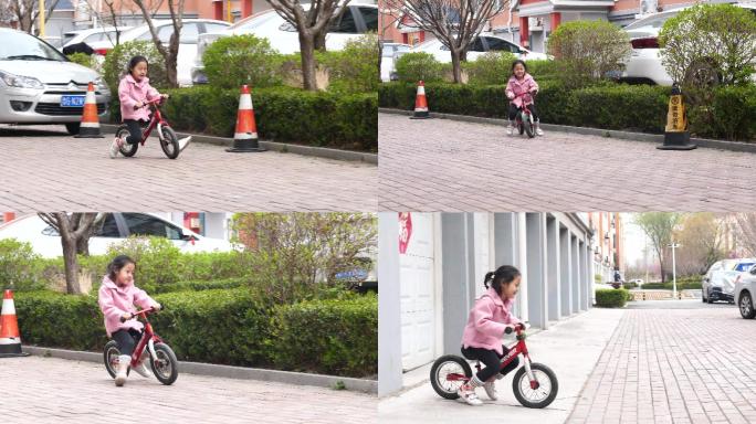 小女孩自己学习平衡车快乐童年