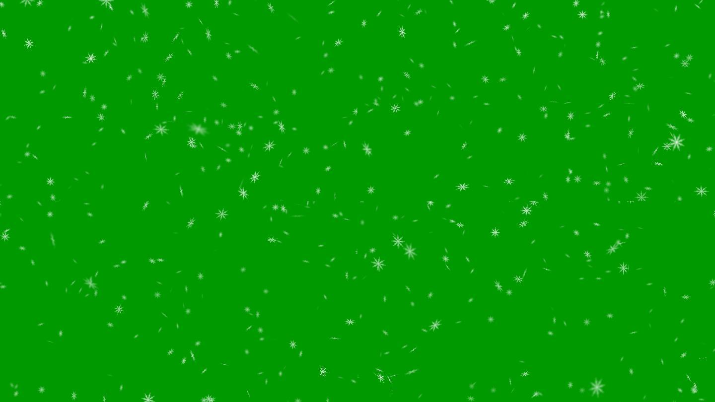 绿色背景上的雪花飘落