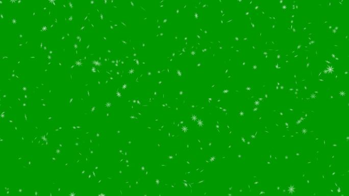 绿色背景上的雪花飘落