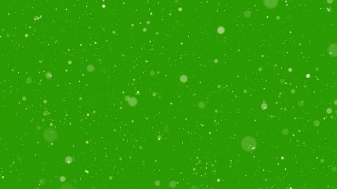 绿色背景上的落雪。