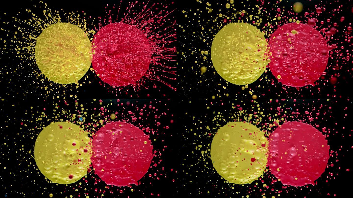 水滴从黄色和红色斑点飞到空中