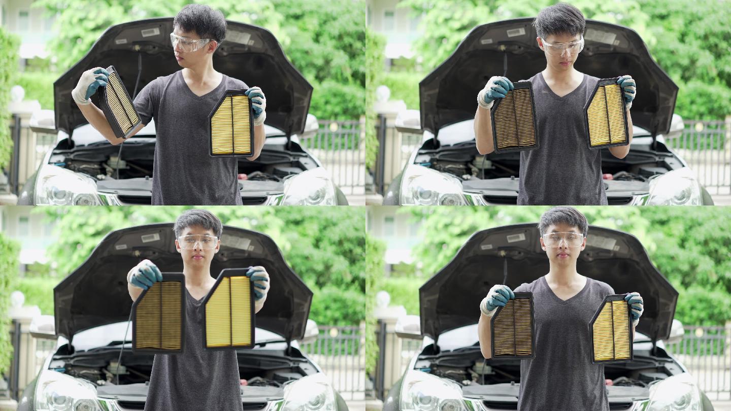 男子展示新旧汽车空气过滤器