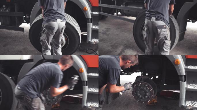 从卡车上卸下车轮更换轮胎汽车维修汽车零部