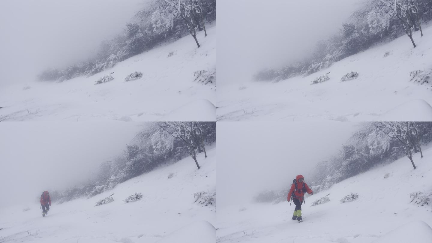 雪山单人红衣徒步行走HDR