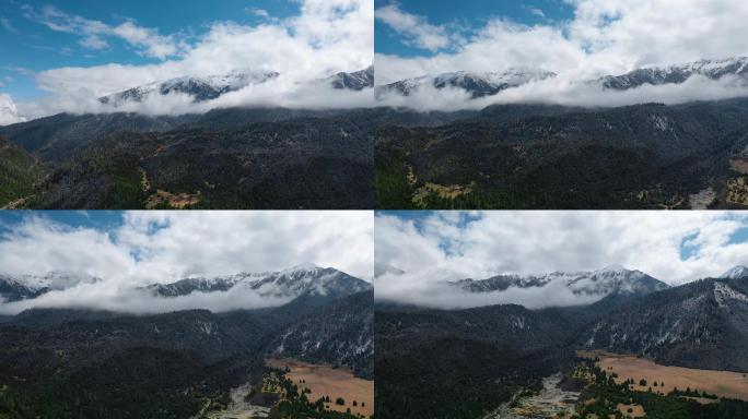 雪山云雾视频玉带云环绕雪山雪峰森林草原