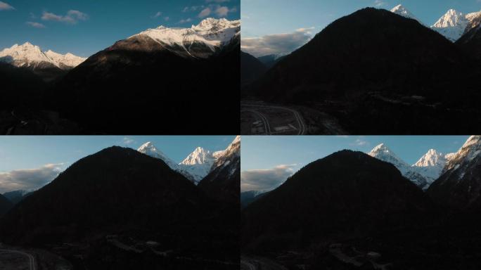 雪山顶峰视频隐藏在大山之间的日照金山雪峰