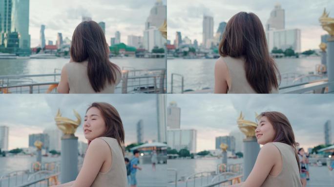 女儿在户外观看城市景观