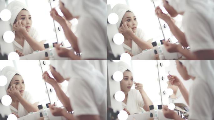 女人在化妆室化妆化妆卸妆美容洗澡精致女人