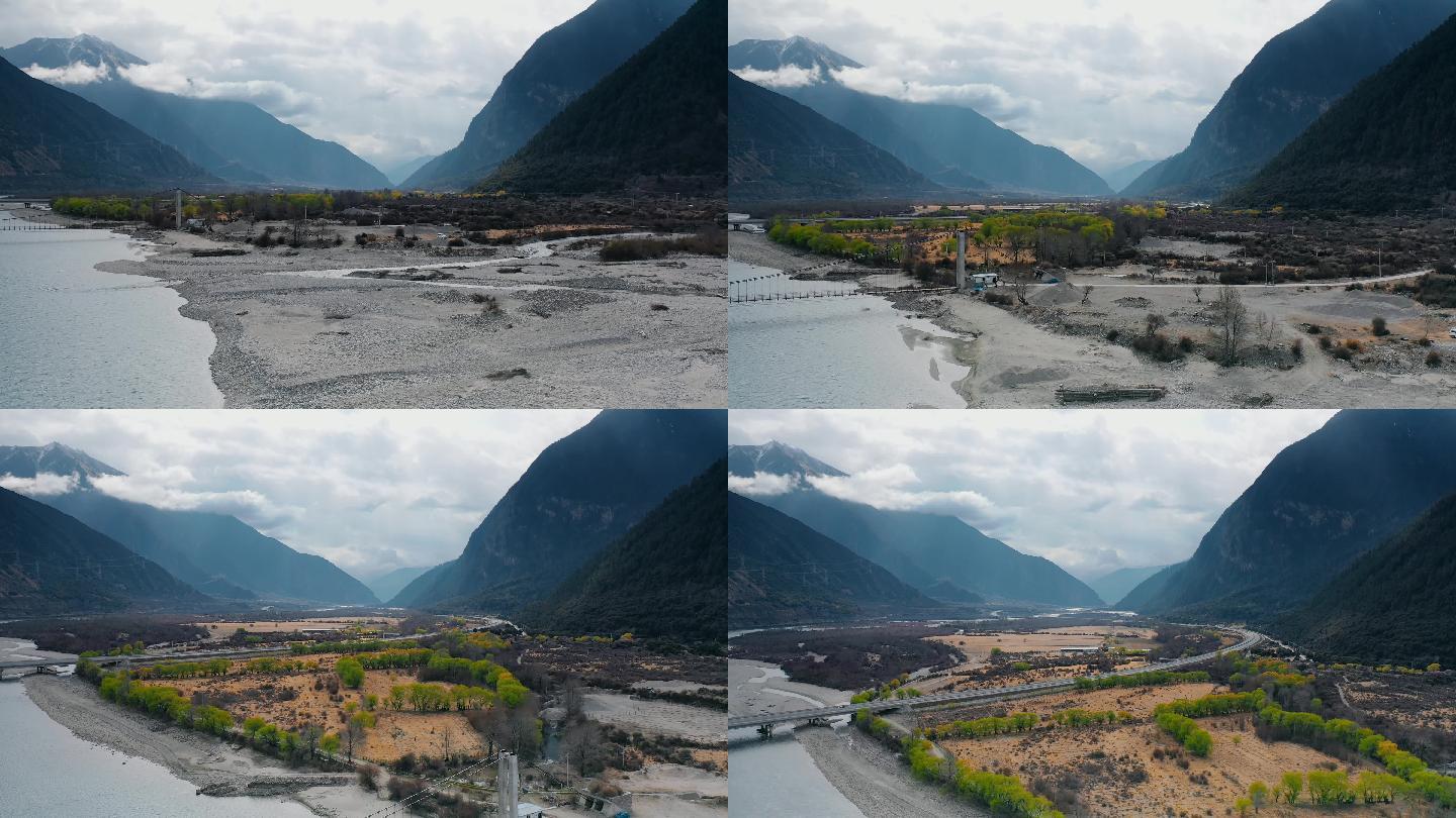 西藏风光视频横跨河流戈壁的高速公路桥