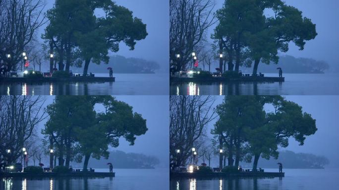 西湖 雨天 情侣 打伞 湖面